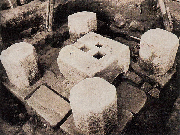 Three niches for sarira carved in the base stone of the pagoda