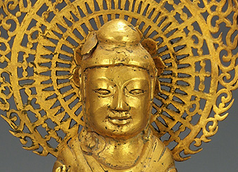 Detail of standing Buddha.